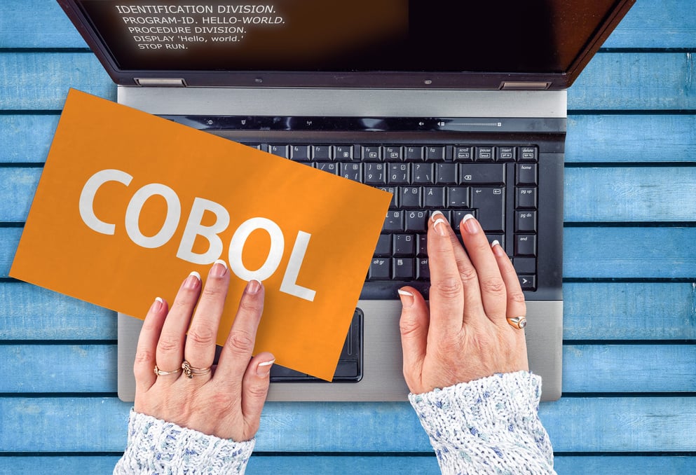 Word Cobol on paper and laptop